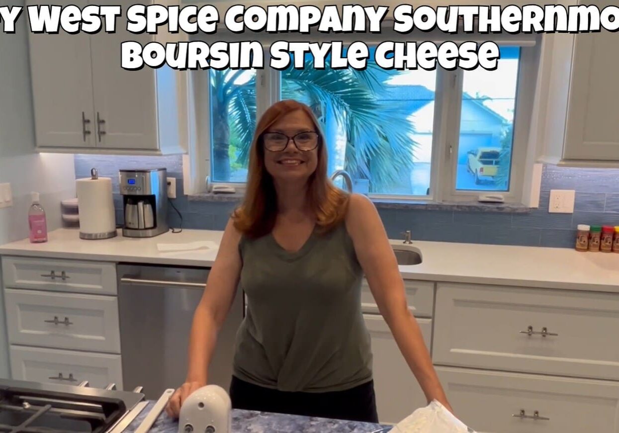 Smiling woman standing in a modern kitchen